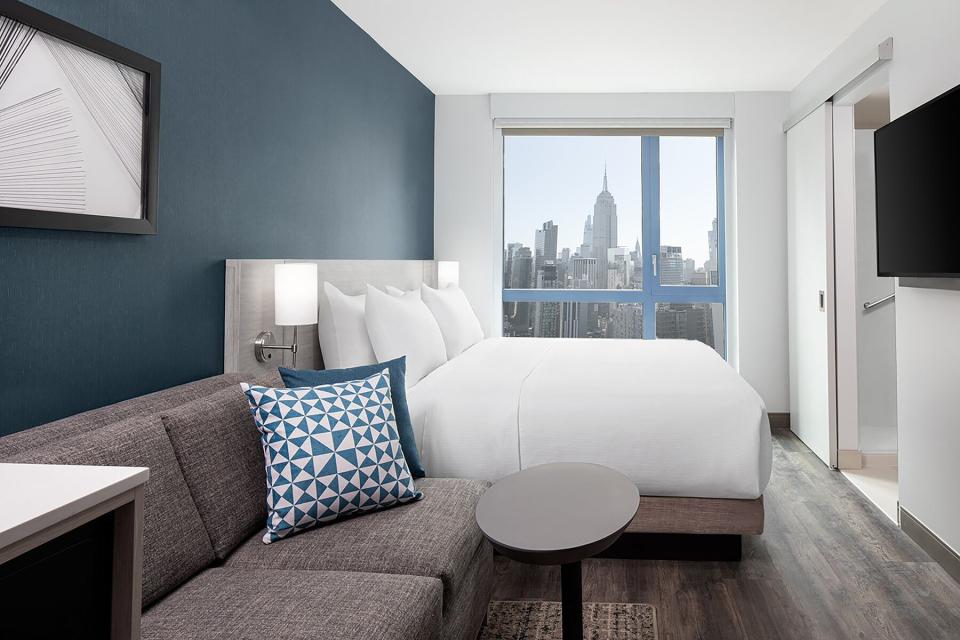 A King Bed With Sofa Empire View guestroom at Hyatt Place New York/Chelsea