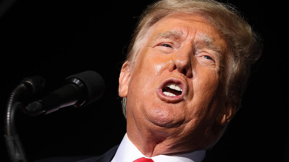 Former U.S. President Donald Trump addresses supporters during a 