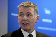 Richard Moore, the Chief of Britain's Secret Intelligence Service, also known as MI6, answers questions after giving his first public speech since becoming head of the organisation, at the International Institute for Strategic Studies, in London, Tuesday, Nov. 30, 2021. China, Russia and Iran pose three of the biggest threats to the U.K. in a fast-changing, unstable world, the head of Britain's foreign intelligence agency said Tuesday. (AP Photo/Matt Dunham)