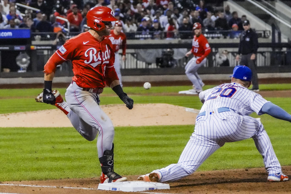 Cincinnati Reds' TJ Friedl beats the throw to first base on a single in the fifth inning of a baseball game against the New York Mets, Saturday, Sept. 16, 2023, in New York. (AP Photo/Bebeto Matthews)