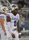 Kansas quarterback Jalon Daniel walks on the field before the team's NCAA college football game against Nevada on Saturday, Sept. 16, 2023, in Reno, Nev. (AP Photo/Andy Barron)