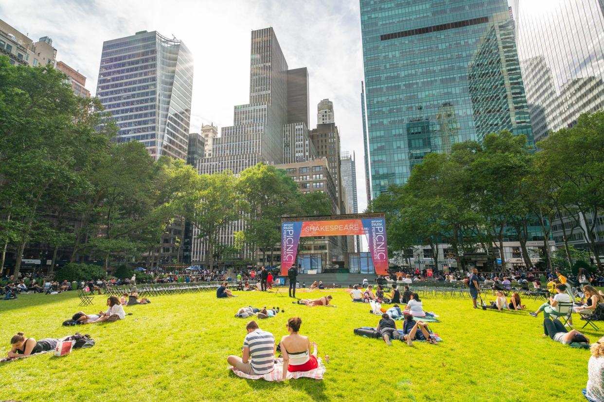 Bryant Park, Also Known as Manhattan's Town Square, NYC. Surrounded by iconic skyscrapers, Bryant Park is visited by more than 12 million people each year.  New York City/USA - May 24, 2019