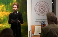 Swedish Culture and Democracy Minister Amanda Lind presents Svenska PEN's Tucholsky Prize to detained Swedish bookseller Gui Minhai in Stockholm