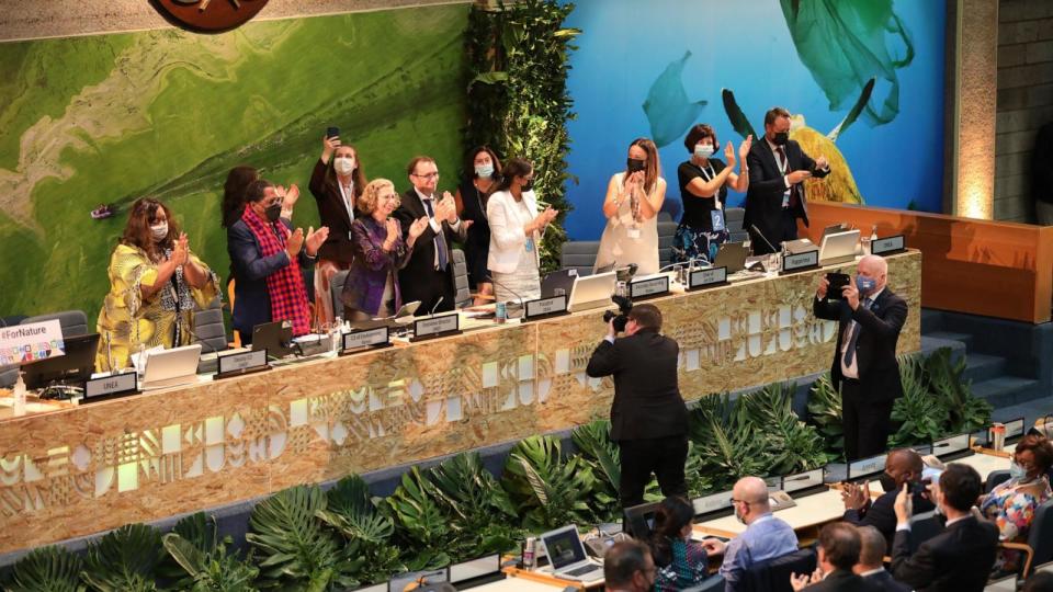 PHOTO: Delegates celebrate for the adoption of a resolution to end plastic pollution at the closing meeting of the resumed fifth session of the UN Environment Assembly UNEA-5 in Nairobi, Kenya, March 2, 2022.  (Dong Jianghui/Xinhua via Getty Images)