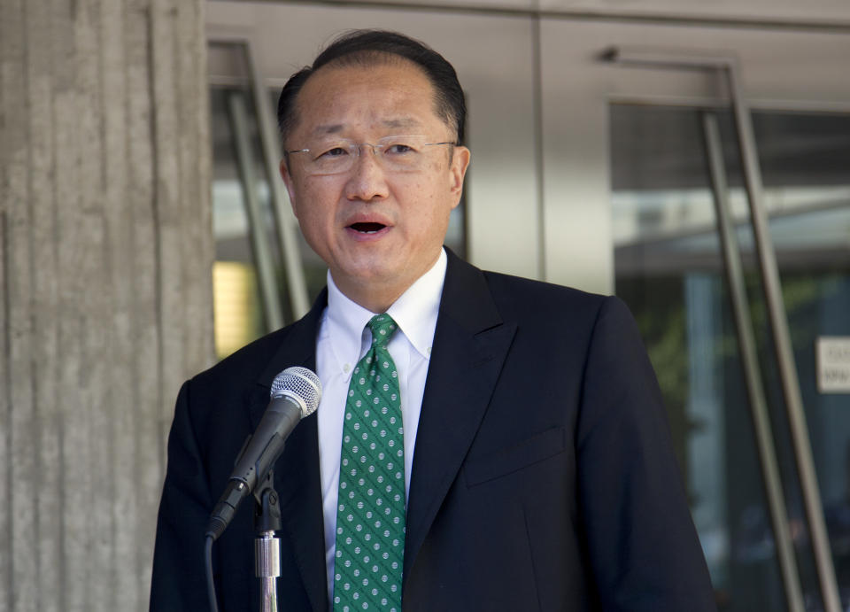 Dr. Jim Yong Kim makes a statement after arriving for his first day as president of the World Bank Group, Monday, July 2, 2012, in Washington. (AP Photo/Evan Vucci)