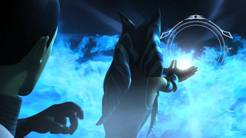 Ahsoka holds back blue energy to protect Ezra on Star Wars Rebels