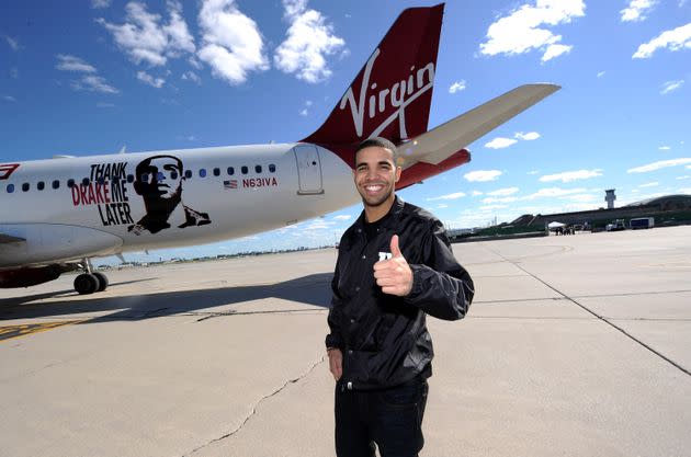 Twelve years after posing in front of his leased tour plane, Drake fully owns his own Boeing 767. (Photo: Michael Buckner via Getty Images)