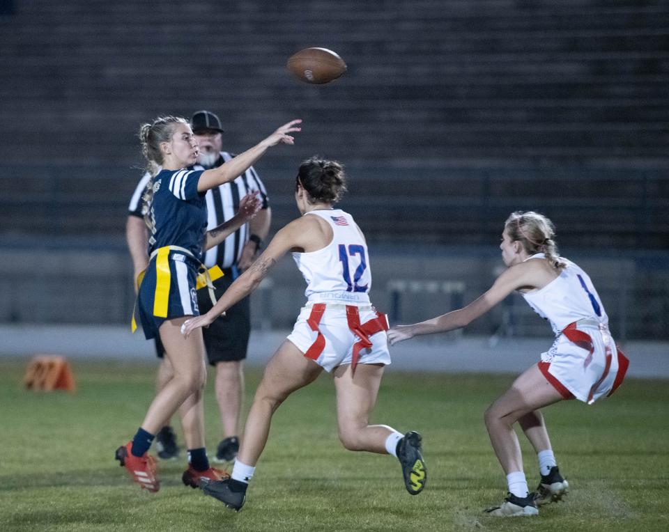 Quarterback Carly Churchward (1) passes during the Pace vs Gulf Breeze flag football at Gulf Breeze High School on Wednesday, March 22, 2023.