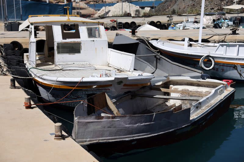 Boats used by migrants are moored at a fishing shelter in Paralimni