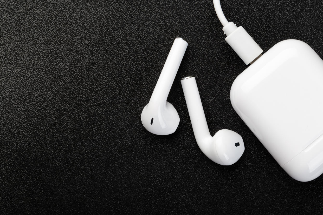 Apple's entry-level AirPods come with a charging case, but that case must be charged using an actual cable. The horror! (Not really.) (Photo: Getty Images)