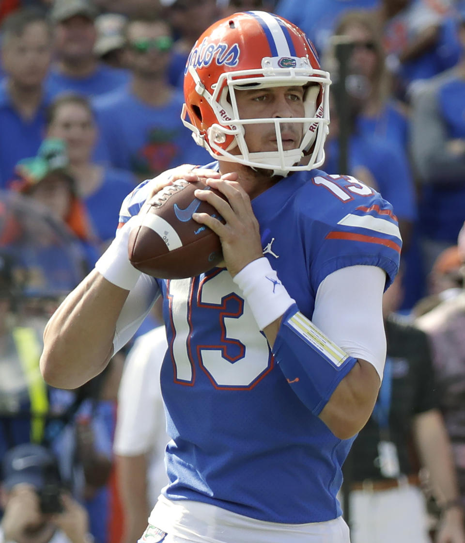 FILE - In this Oct. 6, 2018, file photo, Florida quarterback Feleipe Franks looks for a receiver against LSU during the first half of an NCAA college football game in Gainesville, Fla. Florida and Miami have the college football stage to themselves for 3 ½ hours Saturday, a new chapter in their once-heated and forever-storied rivalry. (AP Photo/John Raoux, File)