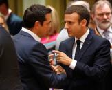 Greek Prime Minister Alexis Tsipras and French President Emmanuel Macron attend the EU summit in Brussels, Belgium, June 22, 2017. REUTERS/Francois Lenoir