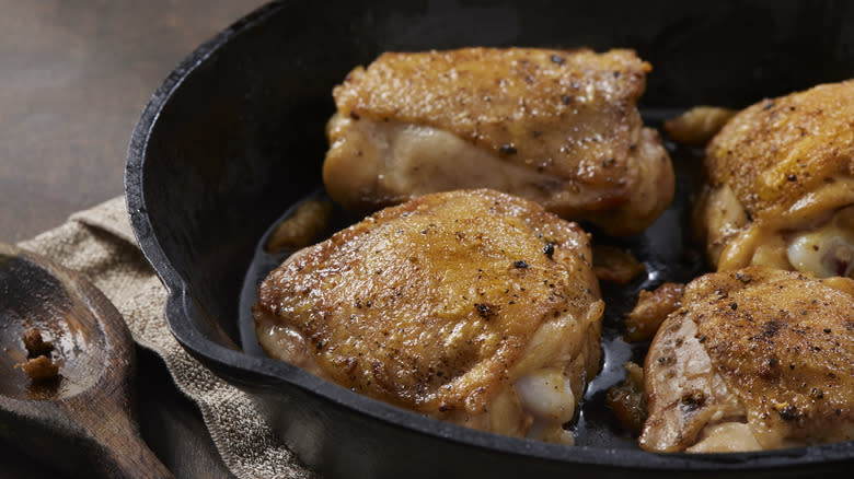 chicken thighs in a skillet