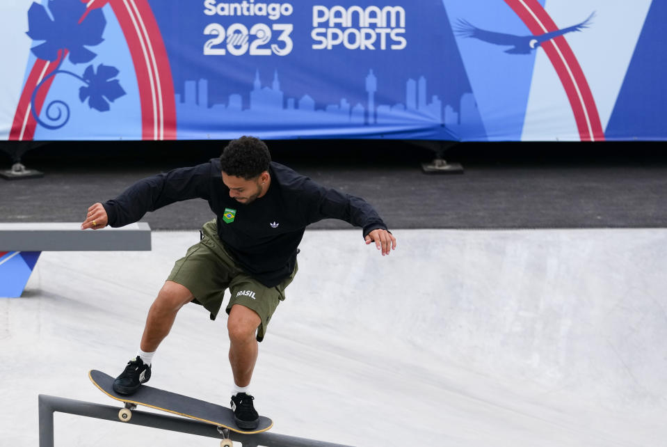 Brazil's Lucas Rabelo competes in the men's skateboarding street final at the Pan American Games in Santiago, Chile, Saturday, Oct. 21, 2023. (AP Photo/Esteban Felix)