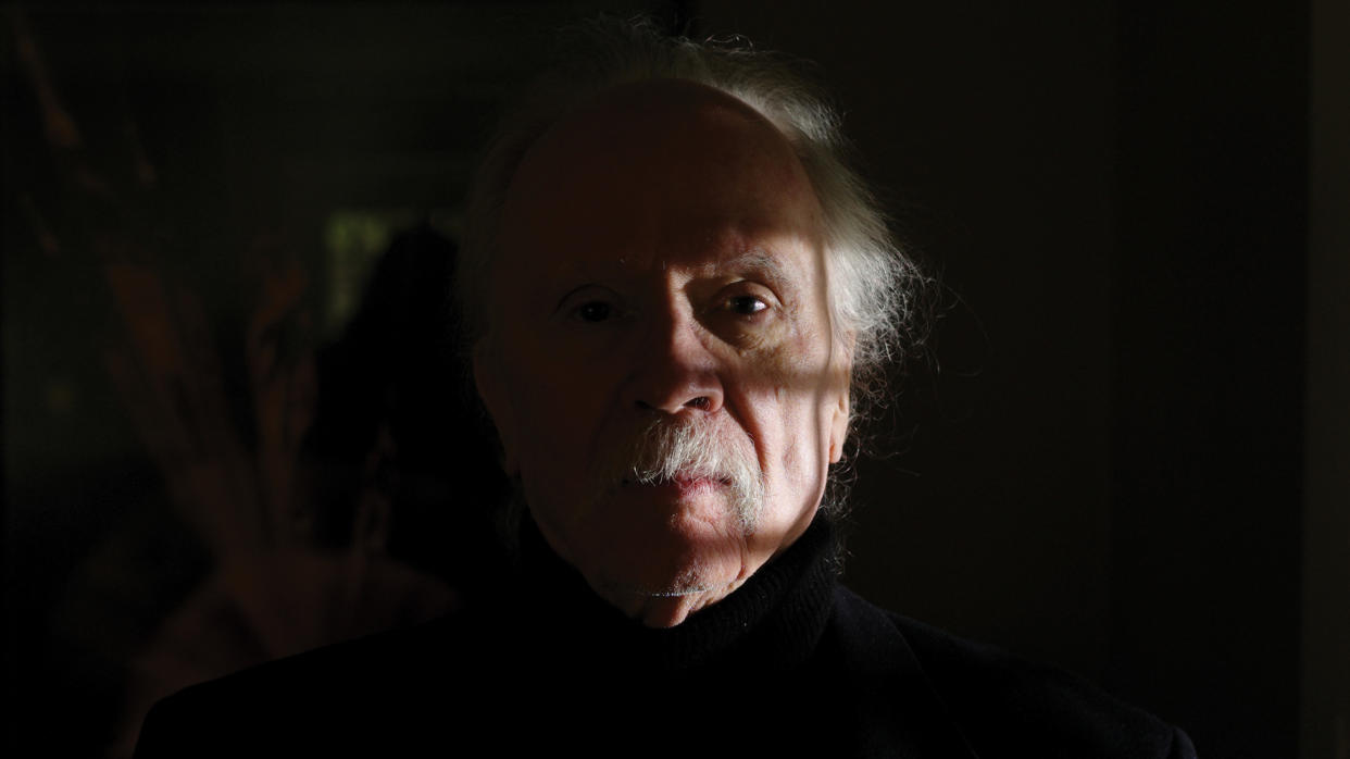  John Carpenter portrait with lots of shadow 