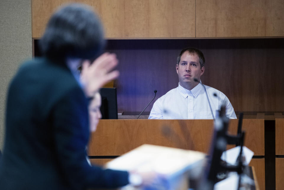 American Matthew Urey is seen in the witness box at the Whakaari White Island eruption trial at the Auckland Environment Court, in Auckland, New Zealand, Wednesday, July 12, 2023. Urey, 39, and his wife Lauren Urey, 35, returned to New Zealand from their home in Richmond, Virginia, to testify in the Auckland District Court on Wednesday in the trial of three tourism companies and three directors charged with safety breaches over the White Island disaster on Dec. 9. 2019. (Jason Oxenham/Pool Photo via AP)