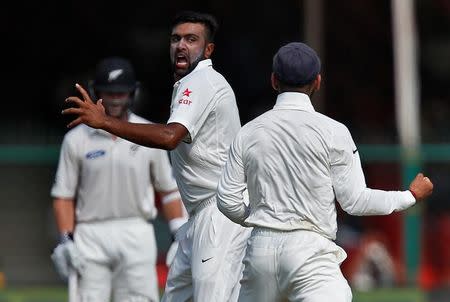 Cricket - India v New Zealand - First Test cricket match - Green Park Stadium, Kanpur, India - 24/09/2016. India's Ravichandran Ashwin celebrates after taking the wicket of New Zealand's Tom Latham. REUTERS/Danish Siddiqui