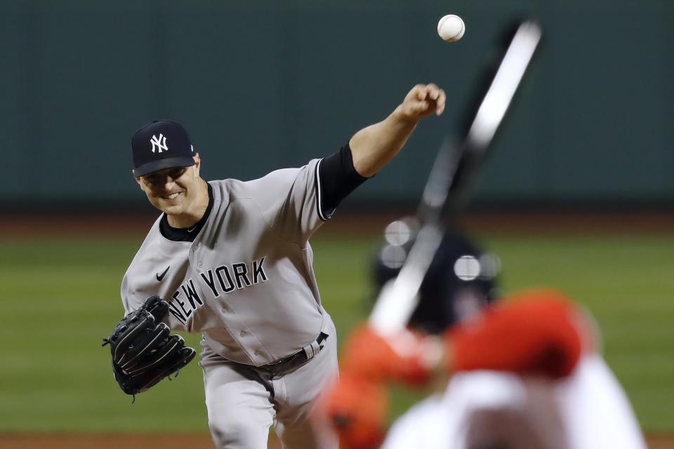 New York Yankees' J.A. Happ pitches against the Boston Red Sox during the first inning of a baseball game, Saturday, Sept. 19, 2020, in Boston. (AP Photo/Michael Dwyer)