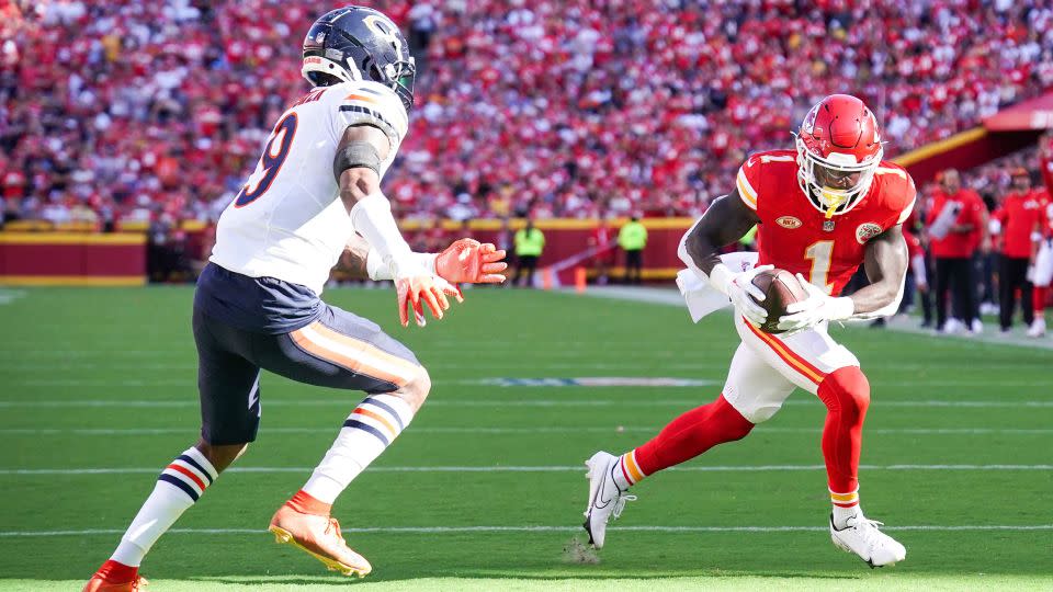 Kansas City Chiefs running back Jerick McKinnon scores a touchdown as Chicago Bears safety Jaquan Brisker defends. - Denny Medley/USA TODAY Network/Reuters