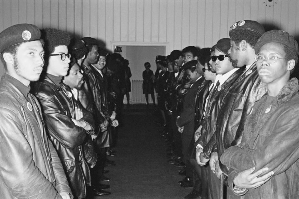 Members of the Black Panther Party attend the funeral of a baby of one of the Black Panthers and a Swedish mother, USA, 19th April 1969. The man on the left is wearing a badge reading ‘Huey Must Be Set Free’, referring to incarcerated Black Panther Party founder Huey P. Newton. (Photo by Jean-Pierre Laffont/Michael Ochs Archives/Getty Images)