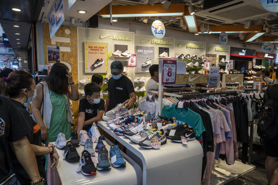 A General view showing people inside a shoe store on August 7, 2022 in Hong Kong, China. Hong Kong residents received Phase 2 of the Consumer Voucher Scheme.  (Photo by Vernon Yuen/NurPhoto via Getty Images)