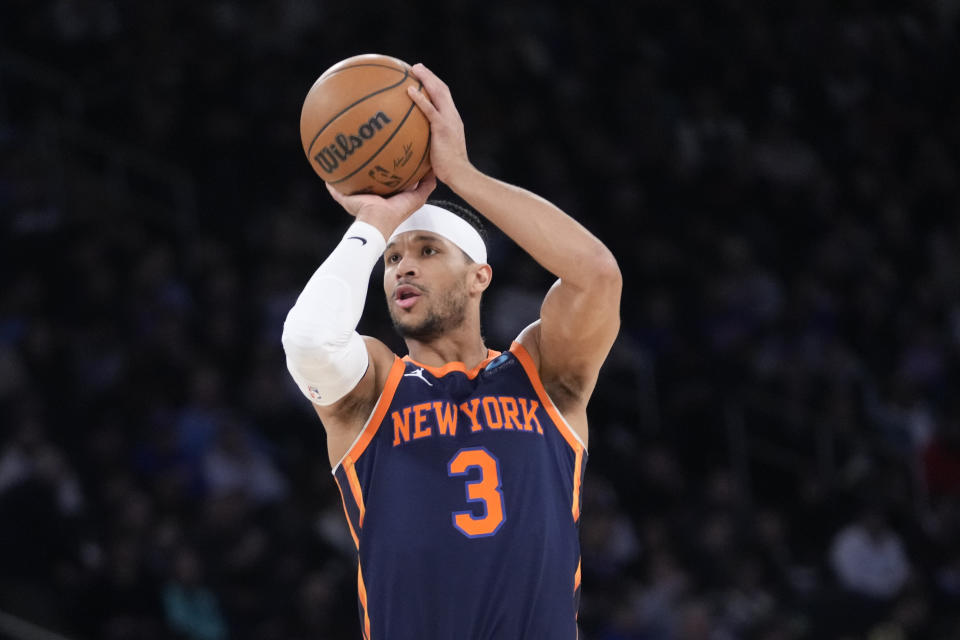 New York Knicks guard Josh Hart shoots a three-point basket during the first half of an NBA basketball game against the Memphis Grizzlies, Tuesday, Feb. 6, 2024, at Madison Square Garden in New York. (AP Photo/Mary Altaffer)