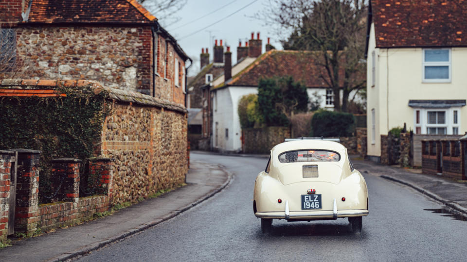 A 1950 Porsche “Gmünd” 356 on the road.