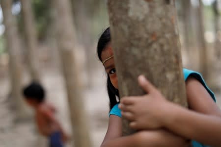 An indigenous girl from the Mura tribe is seen in Itaparana village near Humaita