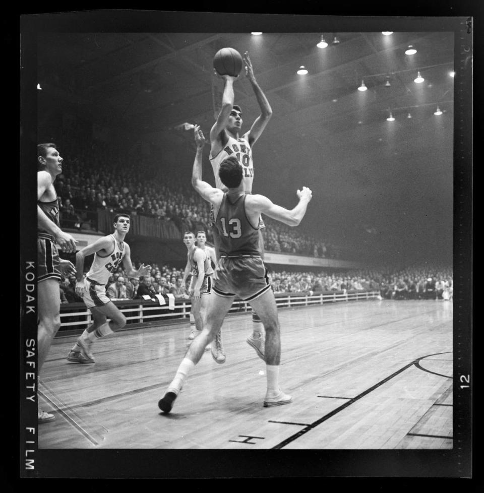 Lennie Rosenbluth shoots over a Wake Forest player during the 1957 ACC Tournament.