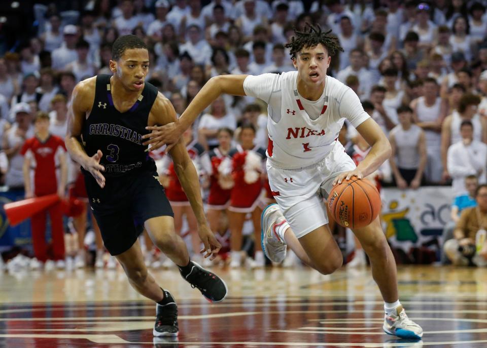 Colin Ruffin, of Nixa, consoles Colin Ruffin during the Eagles 68-51 loss to CBC in the class 6 state championship game of the 2022 Show-Me Showdown at JQH Arena o Friday, March 18, 2022.