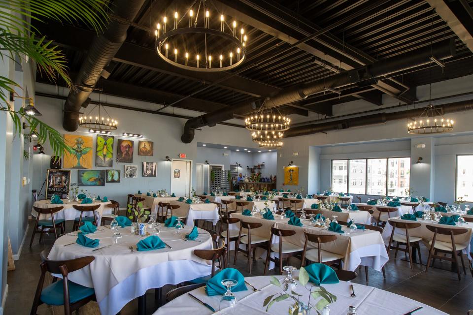 The second floor dining room inside The Beach Gallery, a triple decker multi-purpose building with a cafe, brunch dining room, tea room and rooftop bar, in Keansburg.