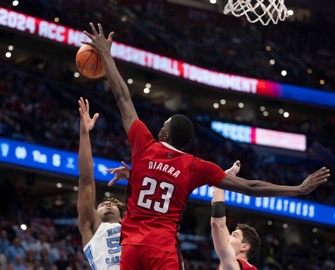 N.C. State’s Mohamed Diarra (23) blocks a shot by North Carolina’s Harrison Ingram (55) in the second half during the ACC Men’s Basketball Tournament Championship at Capitol One Arena on Saturday, March 16, 2024 in Washington, D.C. Diarra had three blocked shots in the Wolfpack victory. 