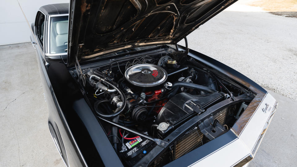 The 295 hp, 350 ci Turbo-Fire V-8 engine inside a 1967 Chevrolet Camaro RS/SS muscle car.