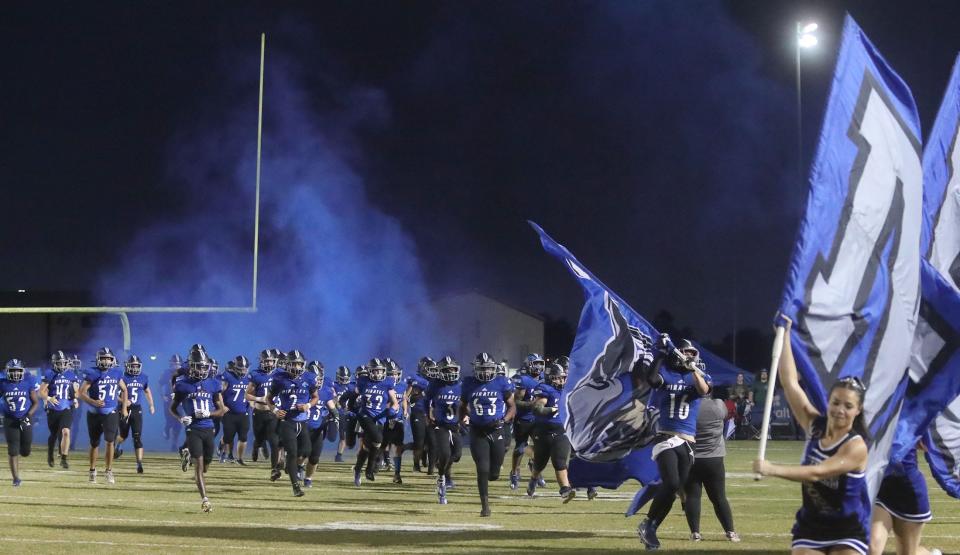 Matanzas players take the field, Friday, Nov. 3, 2023 to take on Winter Springs.