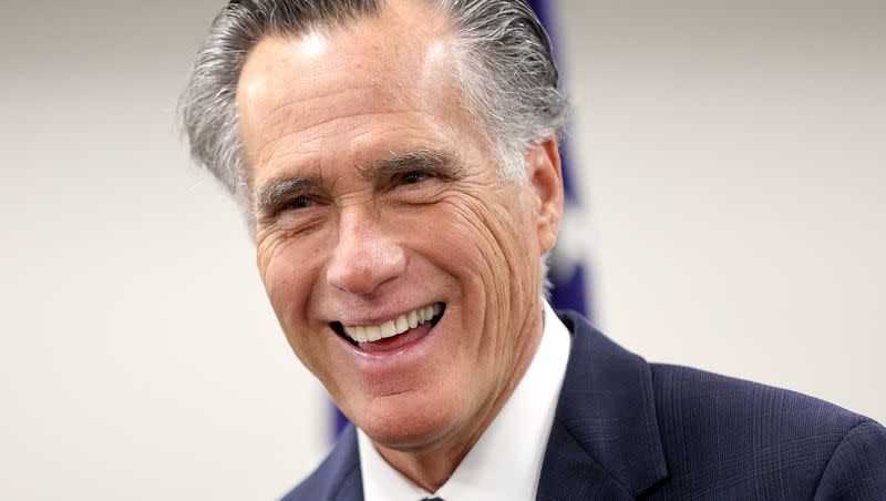 Sen. Mitt Romney, R-Utah, speaks to members of the media while visiting the State Department’s Salt Lake City Passport Fair at the Bennett Federal Building in Salt Lake City on Friday, Feb. 16, 2024.