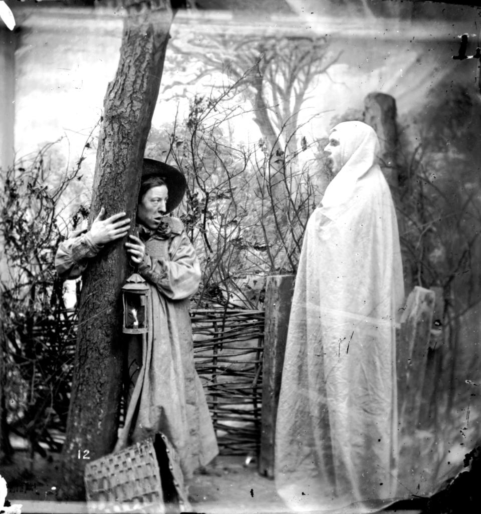 circa 1865: A man clinging to a tree in the face of an apparition in a forest. London Stereoscopic Company Comic Series - 72 (Photo by London Stereoscopic Company/Getty Images)