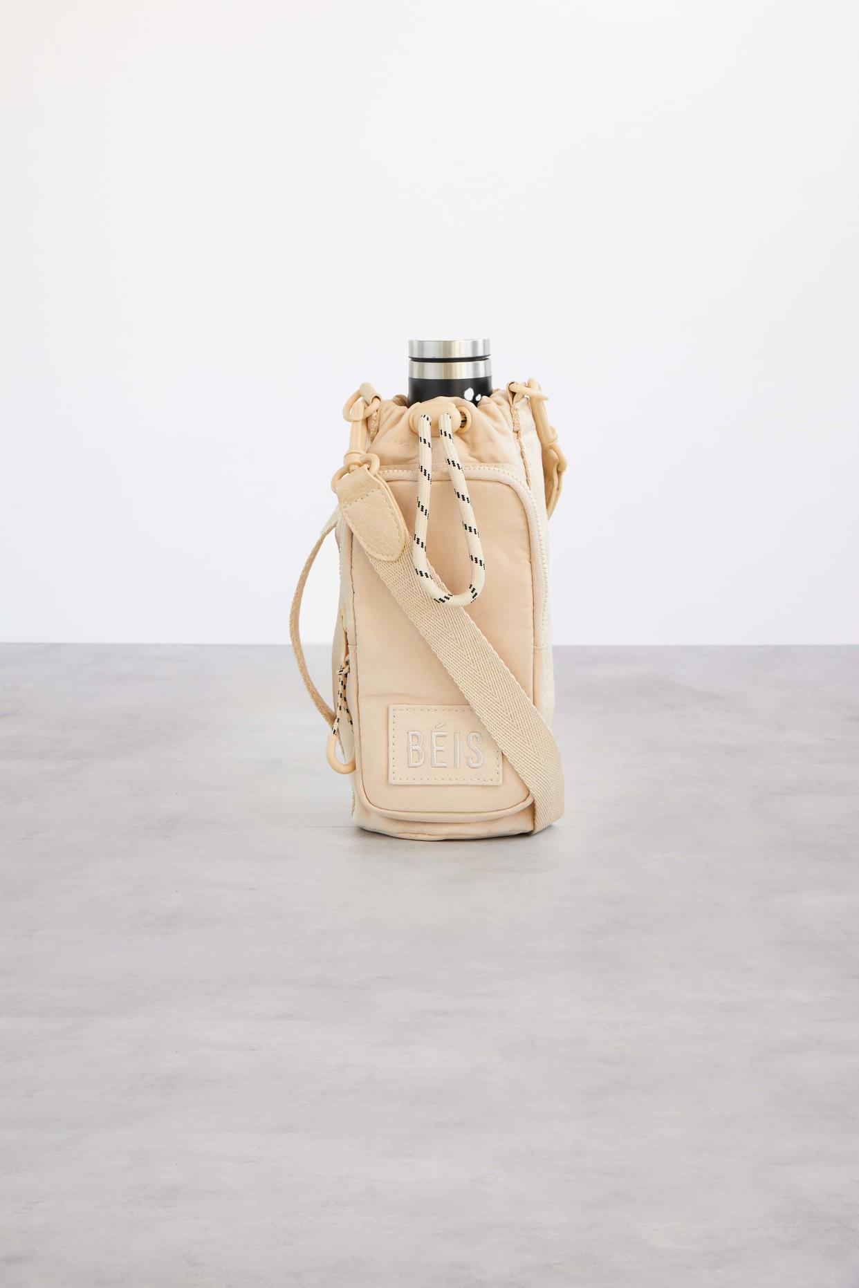 <p><a href="https://go.redirectingat.com?id=74968X1596630&url=https%3A%2F%2Fbeistravel.com%2Fproducts%2Fthe-water-bottle-sling-in-beige&sref=https%3A%2F%2Fwww.womansday.com%2Flife%2Fg3211%2Fbest-friend-gifts%2F" rel="nofollow noopener" target="_blank" data-ylk="slk:Shop Now;elm:context_link;itc:0;sec:content-canvas" class="link rapid-noclick-resp">Shop Now</a></p><p>The Water Bottle Sling</p><p>beistravel.com</p><p>$44.00</p><span class="copyright">Beis</span>