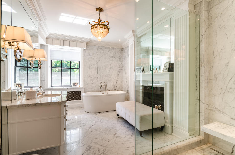 There are 8 bathrooms, with marble for days.
