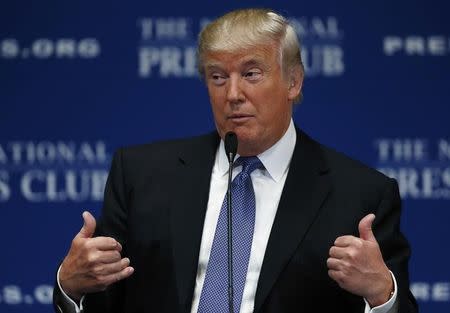 Real estate developer Donald Trump gives a luncheon speech at the National Press Club in Washington May 27, 2014. REUTERS/Gary Cameron