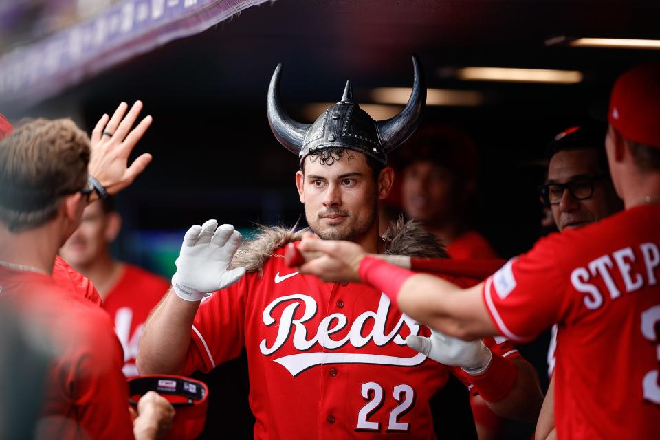 May 17, 2023; Denver, Colorado, USA; Cincinnati Reds catcher Luke Maile (22) celebrates in the dugout on a solo home run in the fifth inning against the Colorado Rockies at Coors Field. Mandatory Credit: Isaiah J. Downing-USA TODAY Sports