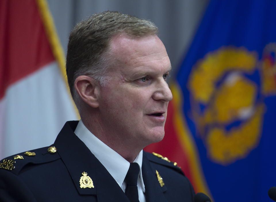 Royal Canadian Mounted Police Supt. Darren Campbell provides an update of the Nova Scotia shootings at RCMP headquarters in Dartmouth, Nova Scotia, Tuesday, April 28, 2020. Police say a gunman who killed 22 people in Nova Scotia this month obtained a replica police car at auction last fall. RCMP Supt. Campbell said Gabriel Wortman outfitted his vehicle with a light bar and decals that made it look almost identical to a genuine RCMP vehicle. (Andrew Vaughan/The Canadian Press via AP)