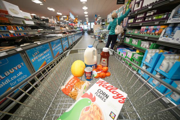 A shopping trolley is filled with groceries at the new Tarleton Aldi store on July 22, 2022 in Tarleton. (Photo: Christopher Furlong via Getty Images)