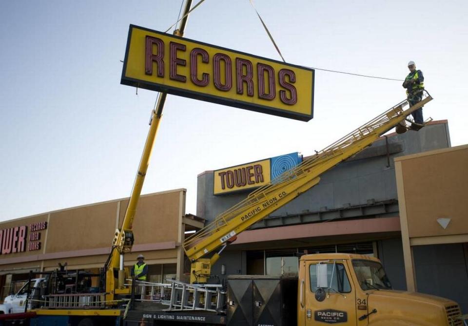Tower Records founder Russ Solomon was on hand as the 30-foot neon sign above the first Tower Records store on Watt Avenue came down in 2009. The sign was donated to the Sacramento History Museum now hangs at Golden 1 Center.