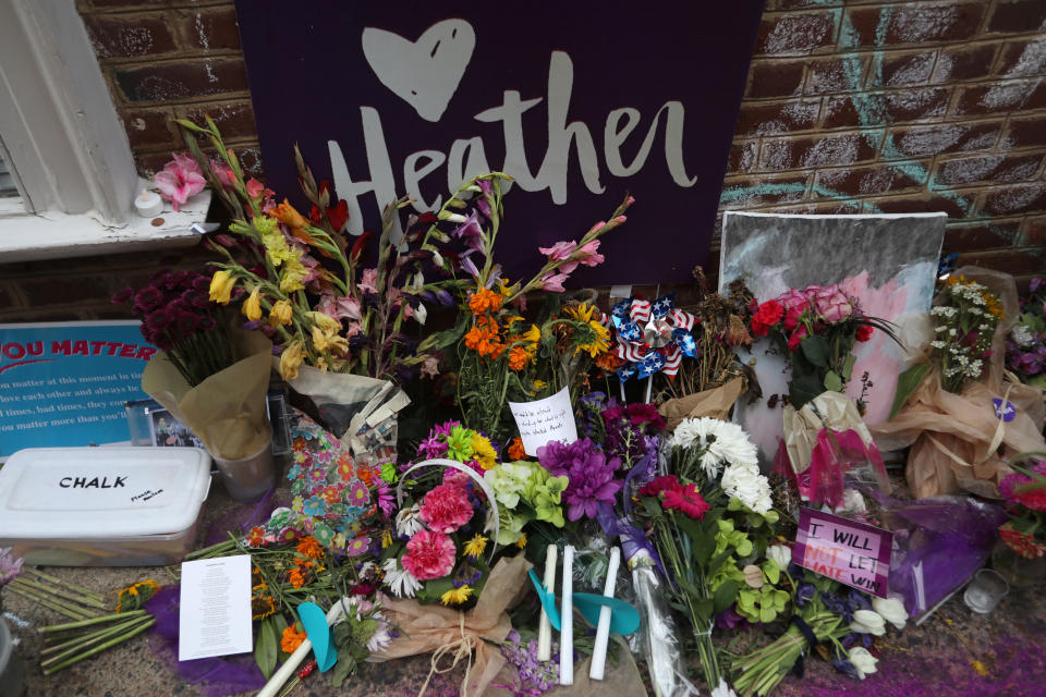 <p>Flowers and messages are left at a memorial to Heather Heyer ahead of the one year anniversary of 2017 Charlottesville “Unite the Right” protests, in Charlottesville, Va., Aug. 11, 2018. (Photo: Jim Urquhart/Reuters) </p>