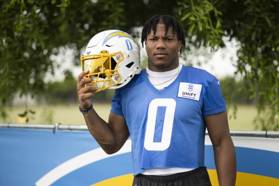 Chargers linebacker Daiyan Henley poses for a photo after a training camp session.