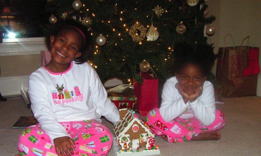 Kaitlyn Paige with her sister on Christmas day in 2009.