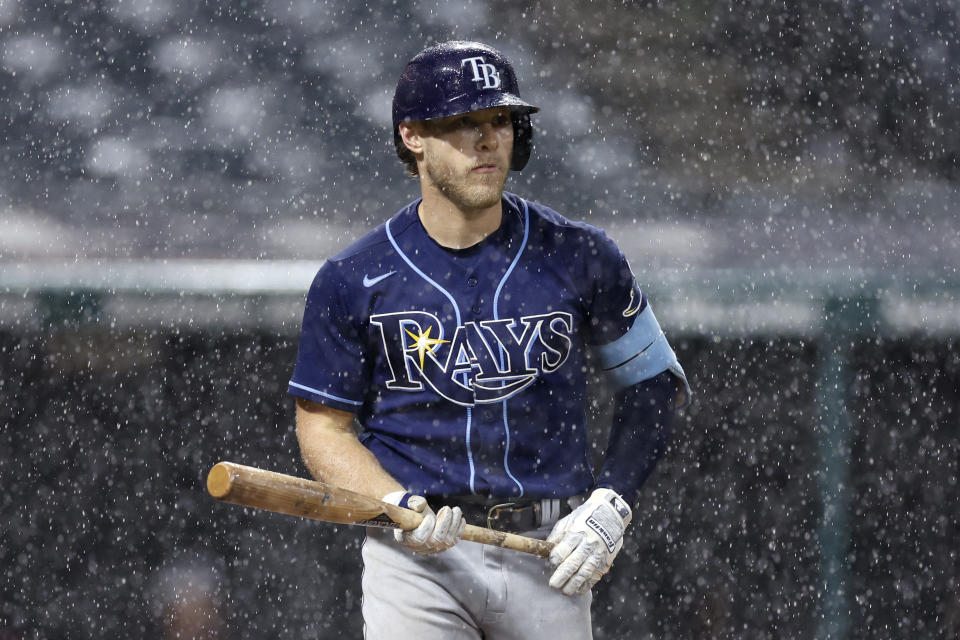 Tampa Bay Rays' Taylor Walls heads to first base after being walked by Cleveland Guardians relief pitcher Sam Hentges during the seventh inning of a baseball game, Wednesday, Sept. 28, 2022, in Cleveland. (AP Photo/Ron Schwane)