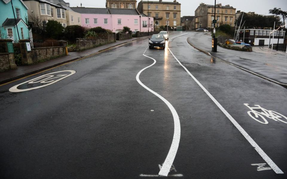 The council originally provoked backlash in January when it painted curvy lines along the beachfront road - Tom Wren, SWNS