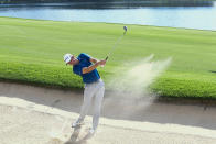 Justin Rose hits from a bunker in the seventh fairway during the third round of the Tour Championship golf tournament Saturday, Sept. 22, 2018, in Atlanta. (AP Photo/John Amis)