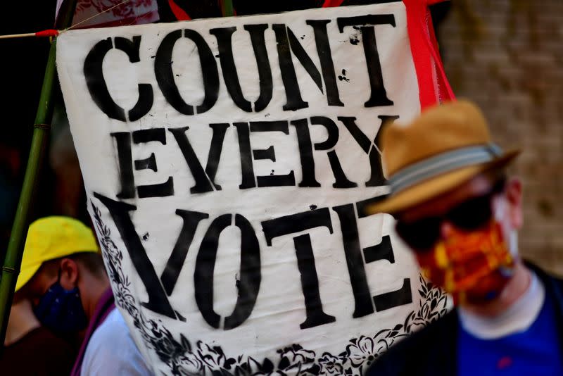 A banner states "COUNT EVERY VOTE" after Democratic presidential nominee Joe Biden overtook President Donald Trump in the Pennsylvania general election vote count in Philadelphia